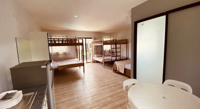 Кровать в общем номере Cerca Parola beach resort