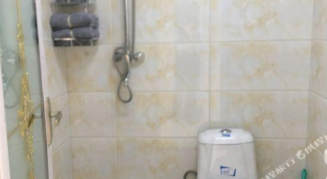 Huacai Apartment Hotel (Beijing Qilinshe)