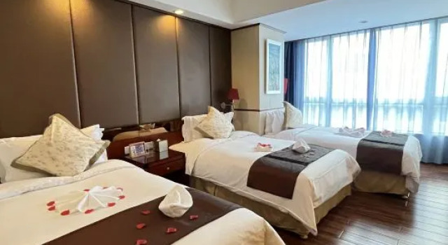 Номер Deluxe Haikou Mingguang Shengyi Hotel