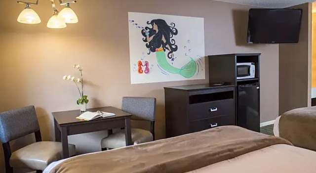 Четырёхместный номер Deluxe Atlantis Family Waterpark Hotel, an Ascend Collection Hotel