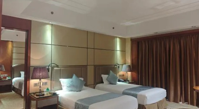 Двухместный семейный люкс с 2 комнатами Yangzhou Mingfa International Hotel