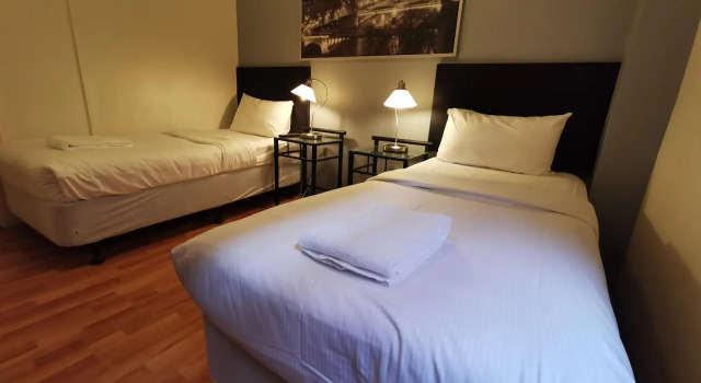 Кровать в общем номере City Centre Budget Hotel