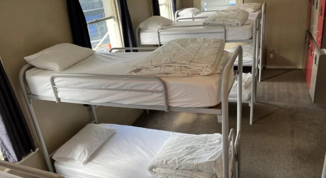 Кровать в общем номере UpTown Backpackers