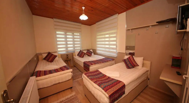 Четырёхместный номер Standard Emiroğlu Konak Otel