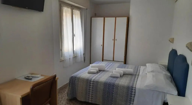 Четырёхместный номер Economy Hotel Barbiani