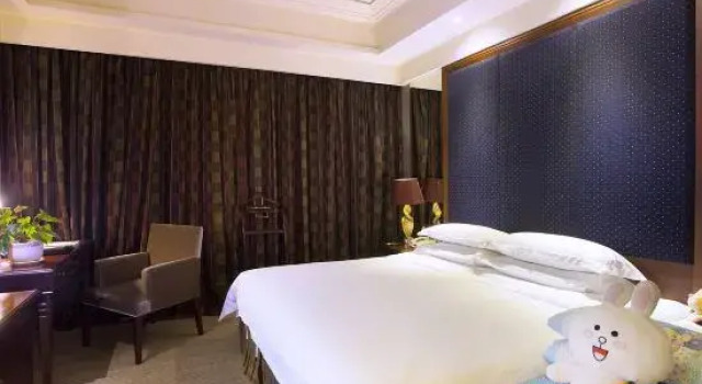 Семейный люкс Business Minghao International Hotel
