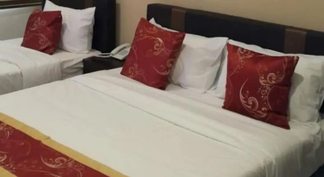 Семейный номер Deluxe Global Inn Hotel