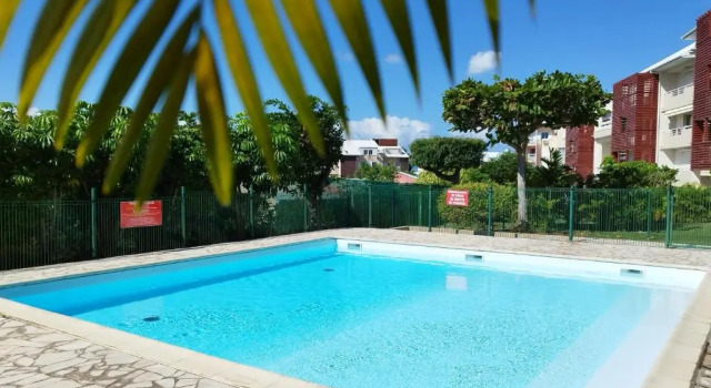 Appartement d'une chambre a Le Gosier a 300 m de la plage avec piscine partagee jardin clos et wifi