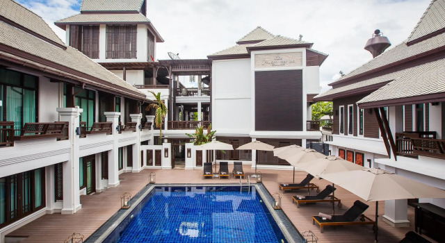 Кровать в общем номере Huernnana Boutique Hotel