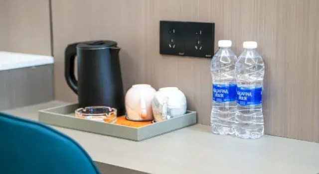 Кровать в общем номере Bo Yue Hotel