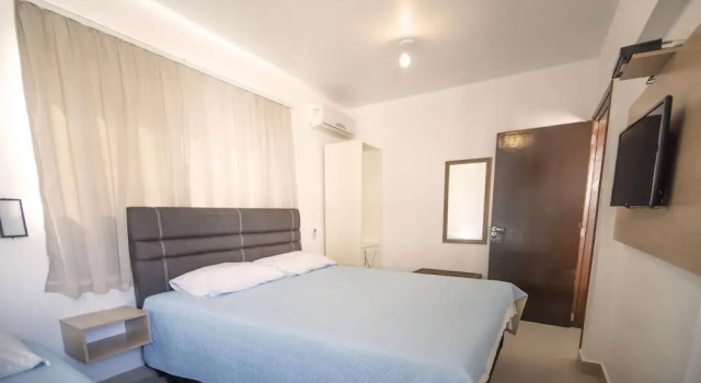Четырёхместный номер Deluxe Pousada Casa de Praia