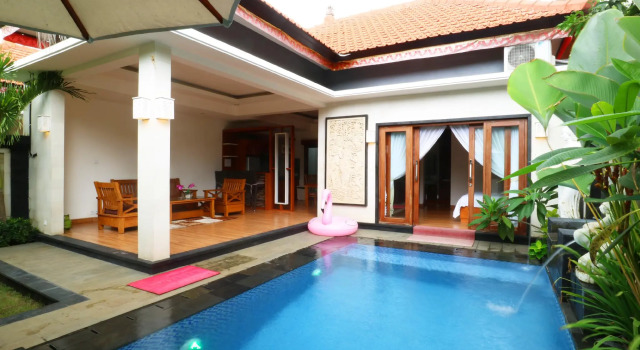 Кровать в общем номере The Umah Pandawa Hotel and Villas