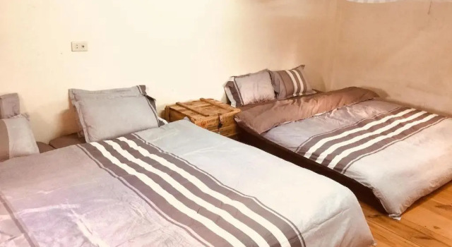 Кровать в общем номере Bao Loc Homestay