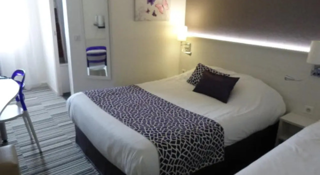 Трёхместный номер Standard Logis Hôtel Alizéa Le Mans Nord