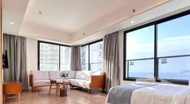 Люкс Yimi Yangguang Seaview Holiday Apartment