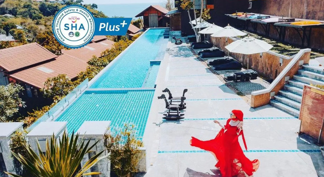 Кровать в общем номере Alama Sea Village Resort and Pool Villa