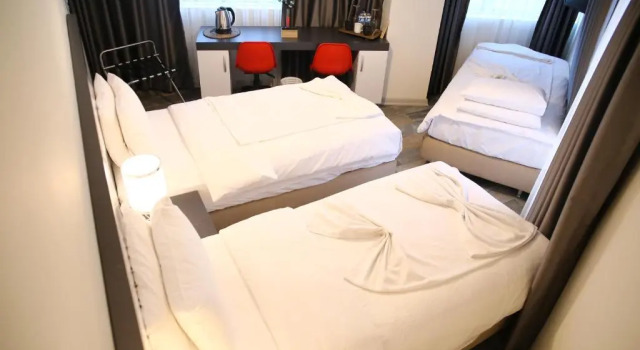 Standardowy trzyosobowy pokój Eva Otel