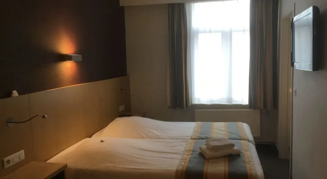 Трёхместный семейный номер Standard Hotel Du Commerce