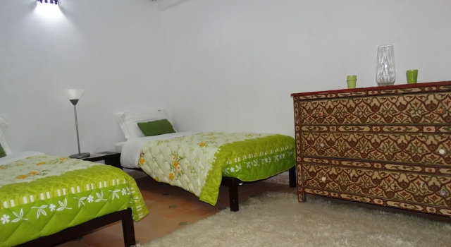 Standard Triple room Palm Auberge