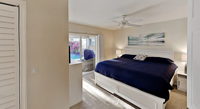 Canal-front W/ Boat Dock & Screened Pool 4 Bedroom Home