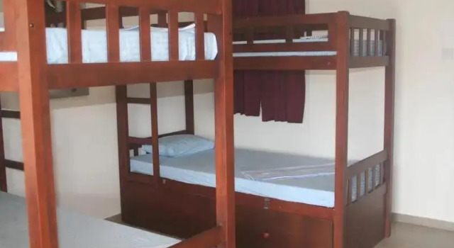 Кровать в общем номере The Long Hostel