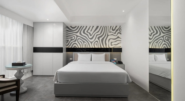 Номер Deluxe J Village Hotel - Triệu Việt Vương