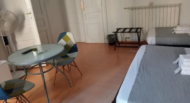 Кровать в общем номере Hotel Brioni