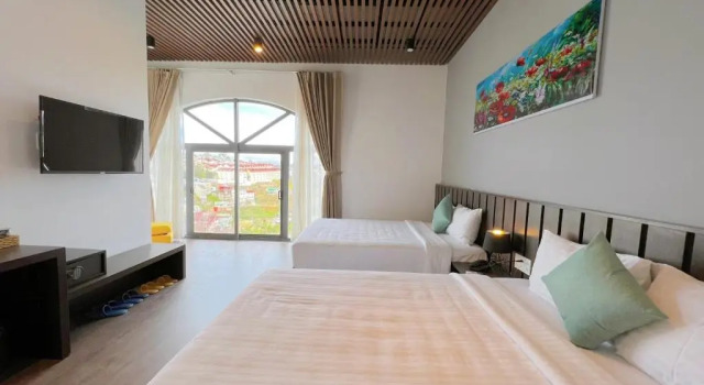 Четырёхместный номер Standard Stillus Boutique Hotel Dalat