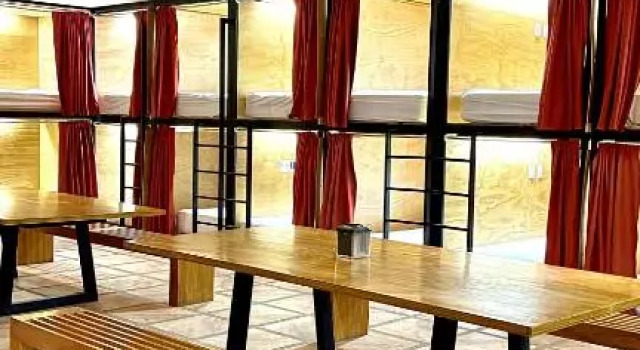 Кровать в общем номере Hotel Cerro Lodge