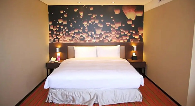 Номер Deluxe Tao Garden Hotel