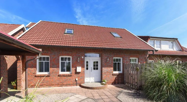 Апартаменты Ferienwohnungen im Haus Friesische Weite