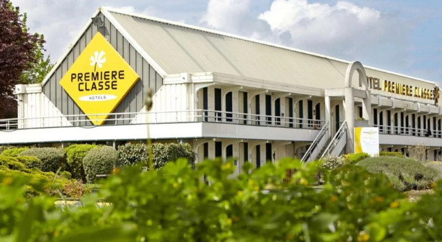 Кровать в общем номере Premiere Classe Vierzon