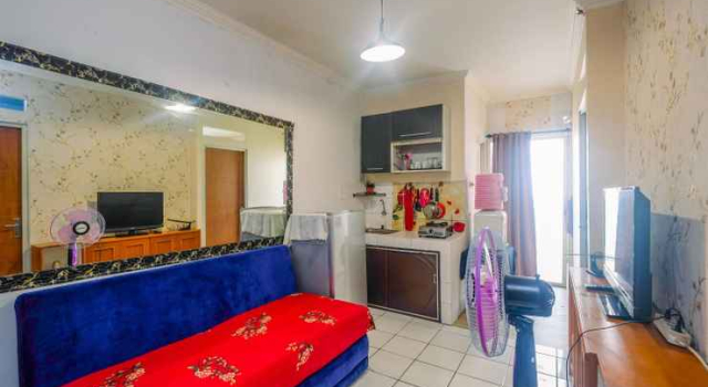 Compact and Homey 2BR Cibubur Village Apartment By Travelio