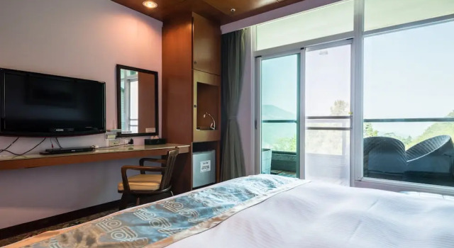 Двухместный номер Deluxe с балконом Shante Hotel Shitou