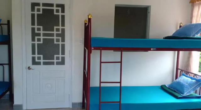 Кровать в общем номере Bana Home & Spa
