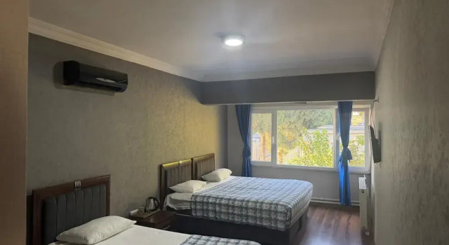 Четырёхместный номер Standard с видом на бассейн Kılıç AirPort otel