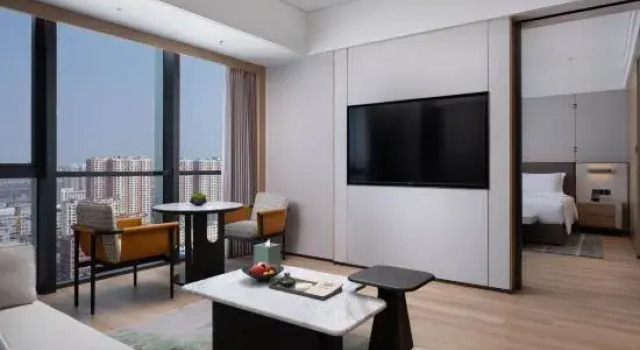 Двухместный люкс Deluxe New World Jinzhou Hotel