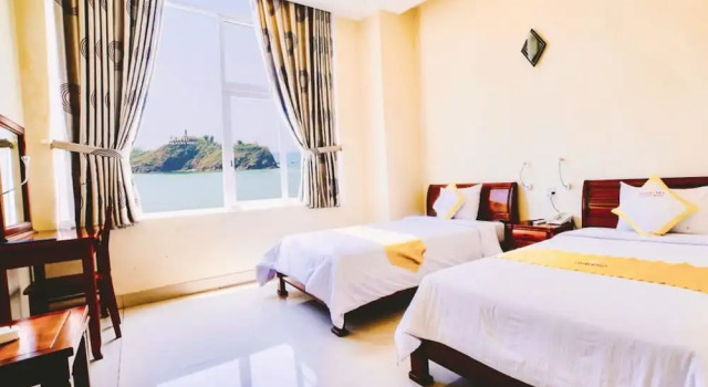 Трёхместный номер Deluxe с балконом и с частичным видом на океан Hoang Yen Canary Hotel