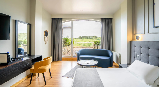 Номер Deluxe Abba Comillas Hotel