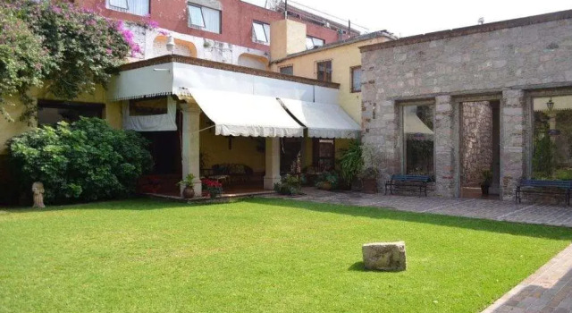 Кровать в общем номере Howard Johnson by Wyndham Morelia Calle Real