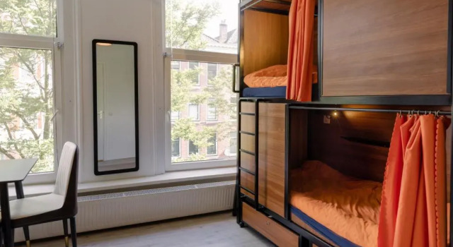 Кровать в общем номере Recharge Hostel