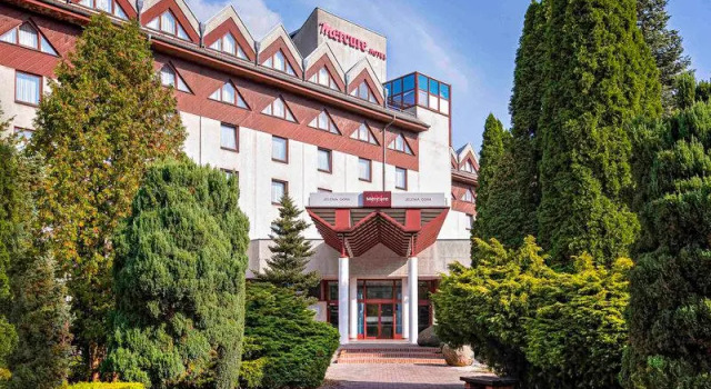 Кровать в общем номере Mercure Jelenia Góra