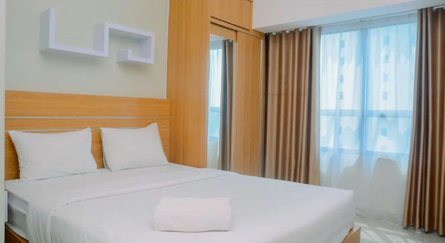 Номер Standard New Furnsihed Studio Room Apartment at Springlake Bekasi By Travelio