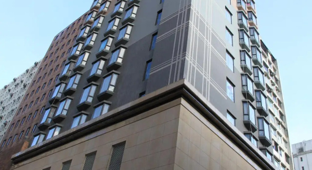 Кровать в общем номере Largos Hotel