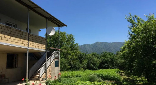 Кровать в общем номере Olya Guest house