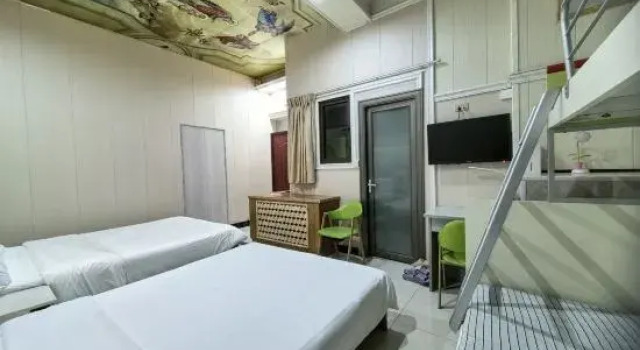Кровать в общем номере Chenxi Homestay (Guilin Chengnan Wanda Plaza)