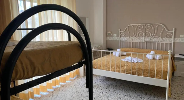 Четырёхместный номер Standard Hotel Modenese