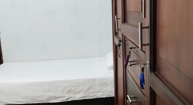 Кровать в общем номере shanty guest house