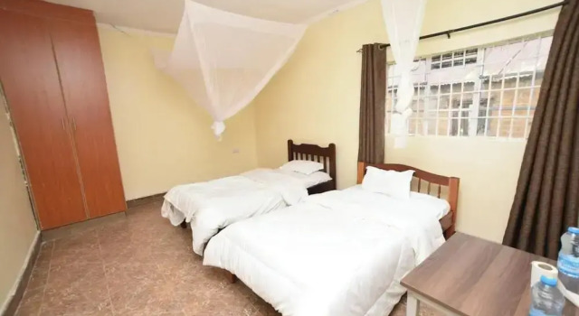 Двухместный номер Standard с видом на сад Waikiki Guest House Kiminini