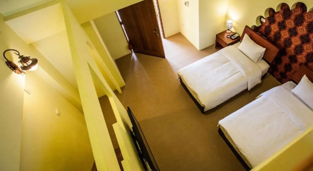 Четырёхместный номер Standard с балконом Oasis Hotel